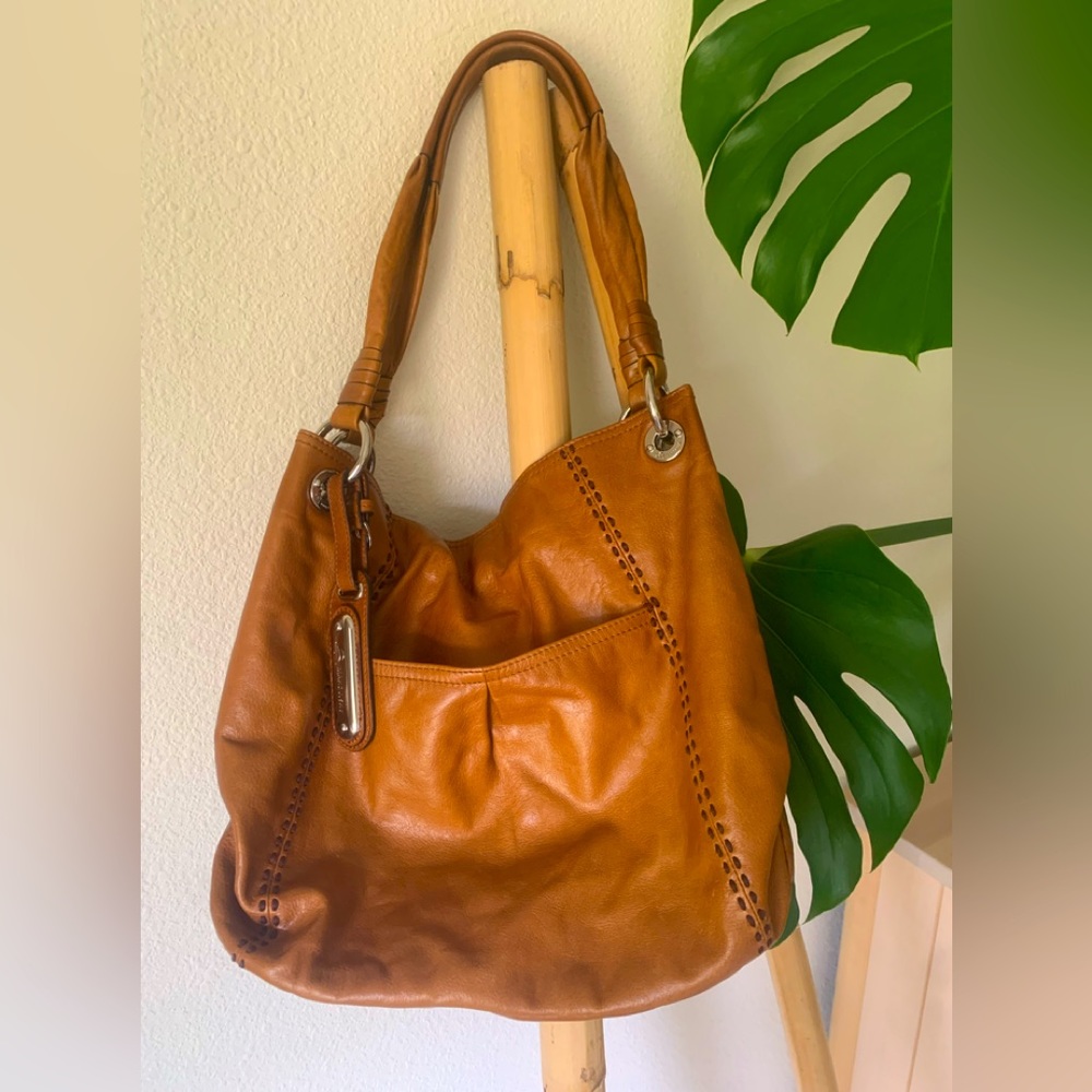 B. Makowsky brown leather shoulder bag.